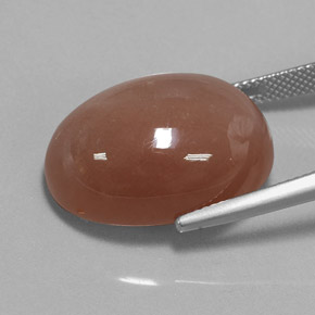 Pedra da lua laranja natural 26,52ct, corte oval, opaco