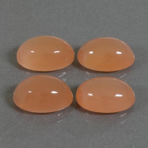 Pedras preciosas de pedra da lua laranja natural de 14,46 ct, corte oval, translúcido