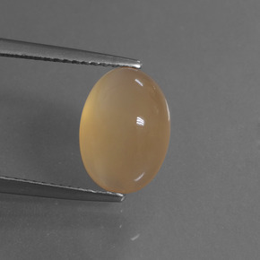 Pedra da lua dourado natural 4,63ct, corte oval, translúcido