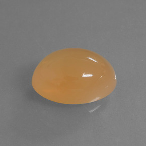 Pedra da lua laranja natural 6,14ct, corte oval, translúcido