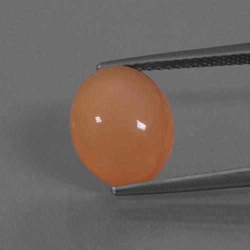 Pedra da lua laranja natural 4,51ct, corte oval, translúcido