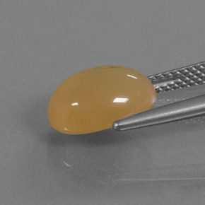 Pedra da lua dourado natural 3,84ct, corte oval, translúcido