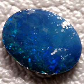 Dupleto de opala multicolorido natural 0,66ct, corte oval, opaco