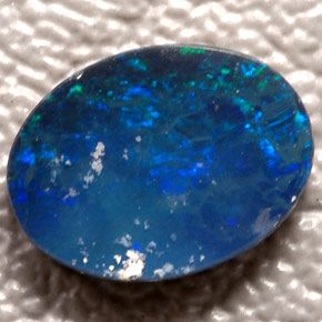 Dupleto de opala multicolorido natural 0,66ct, corte oval, opaco