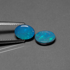 Pedras preciosas de dupleto de opala multicolorido natural de  ct, corte oval, opaco