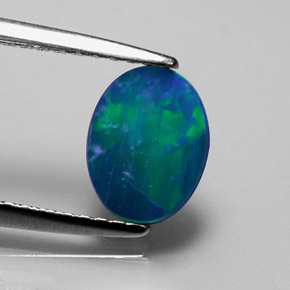 Dupleto de opala multicolorido natural 0,73ct, corte oval, opaco