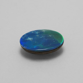 Dupleto de opala multicolorido natural 0,73ct, corte oval, opaco