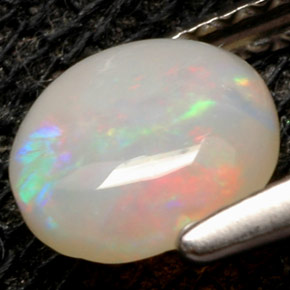 Opala multicolorido natural 0,52ct, corte redondo, opaco