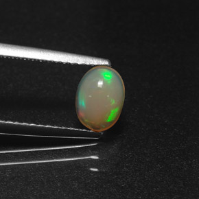 Opala multicolorido natural 0,58ct, corte oval, translúcido