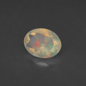 Opala multicolorido natural 0,77ct, corte oval, transparente