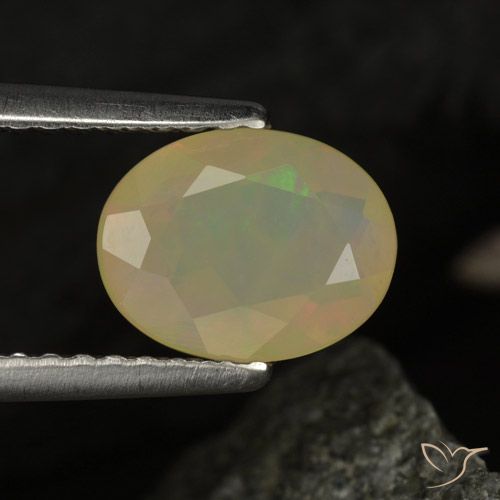 0.97ct Natural Multicolorido Opala, oval, Transparente/Translúcido