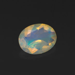 Opala multicolorido natural 0,99ct, corte oval, transparente