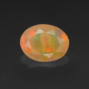 Opala multicolorido natural 0,97ct, corte oval, opaco
