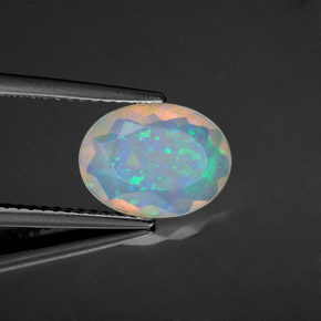 Opala multicolorido natural 1,22ct, corte oval, transparente