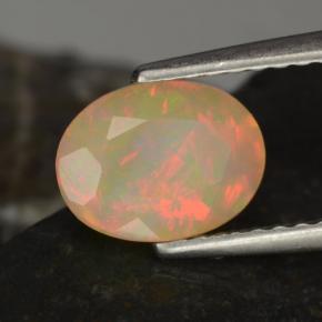 Opala multicolorido natural 0,97ct, corte oval, translúcido