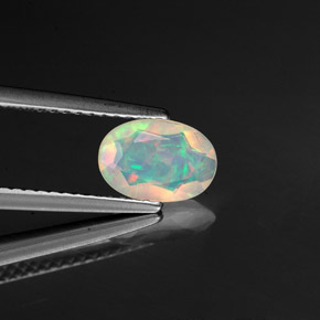 Opala multicolorido natural 0,57ct, transparente, transparente/translúcido