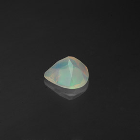 Opala multicolorido natural 0,61ct, transparente, transparente/translúcido