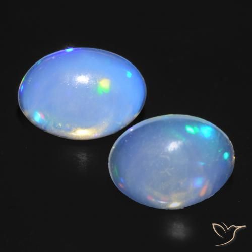 0.85ctw Natural Branco azulado Opala, oval, Transparente