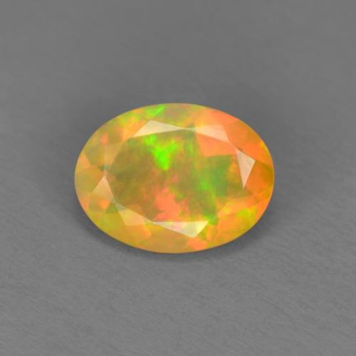 Opala multicolorido natural 0,74ct, corte oval, translúcido