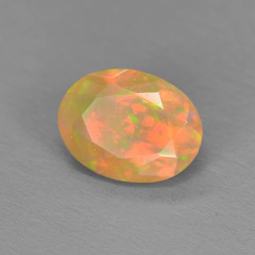 Opala multicolorido natural 0,86ct, corte oval, translúcido