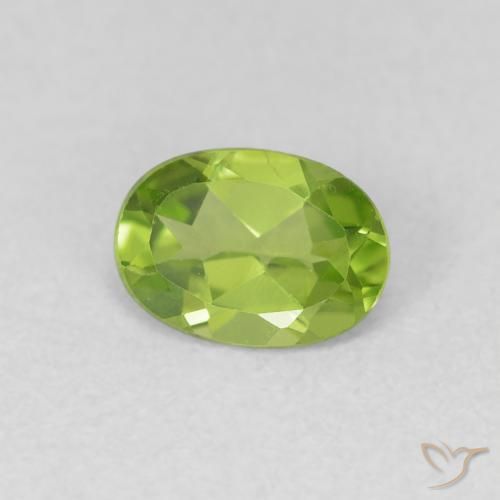 Peridoto verde vivo Natural 0.77ct, oval, VVS-VS
