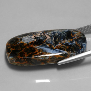 Pietersita multicolorido natural 52,84ct, almofada cortada, opaco