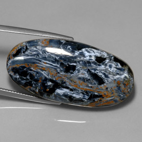 Pietersita multicolorido natural 37,75ct, corte oval, opaco