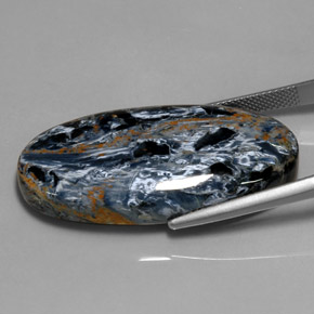 Pietersita multicolorido natural 37,75ct, corte oval, opaco
