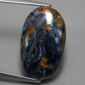 Pietersita multicolorido natural 10,89ct, corte oval, opaco