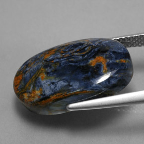 Pietersita multicolorido natural 10,89ct, corte oval, opaco