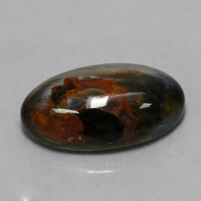 Pietersita multicolorido natural 6,14ct, corte oval, opaco