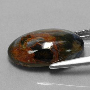 Pietersita multicolorido natural 6,14ct, corte oval, opaco