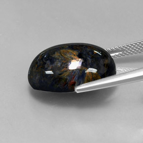 Pietersita multicolorido natural 12,85ct, corte oval, opaco