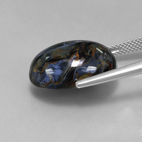 Pietersita multicolorido natural 13,01ct, corte oval, opaco