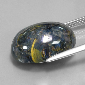 Pietersita multicolorido natural 12,78ct, corte oval, opaco