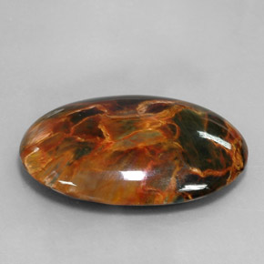 Pietersita multicolorido natural 24,67ct, corte oval, opaco