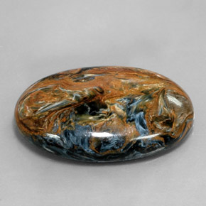 Pietersita multicolorido natural 31,58ct, corte oval, opaco