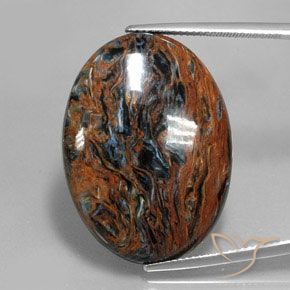 Pietersita multicolorido natural 26,24ct, corte oval, opaco