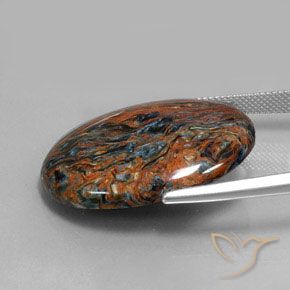 Pietersita multicolorido natural 26,24ct, corte oval, opaco