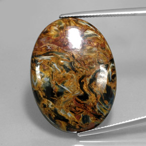 Pietersita multicolorido natural 27,92ct, corte oval, opaco