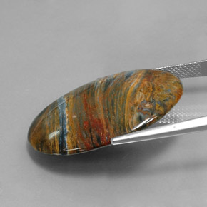 Pietersita multicolorido natural 20,19ct, corte oval, opaco
