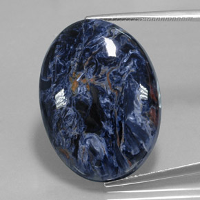 Pietersita multicolorido natural 31,93ct, corte oval, opaco