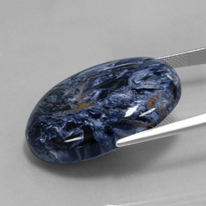 Pietersita multicolorido natural 31,93ct, corte oval, opaco