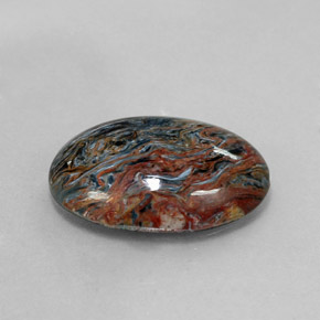 Pietersita multicolorido natural 6,85ct, corte oval, opaco