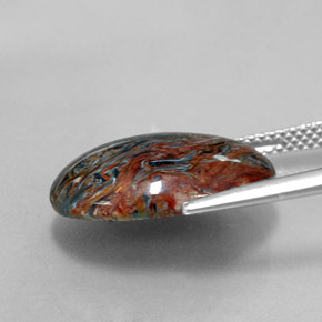 Pietersita multicolorido natural 6,85ct, corte oval, opaco