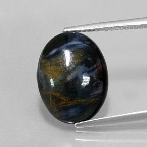 Pietersita multicolorido natural 5,59ct, corte oval, opaco