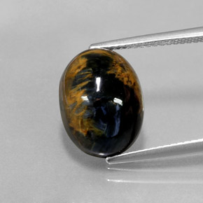 Pietersita multicolorido natural 6,03ct, corte oval, opaco