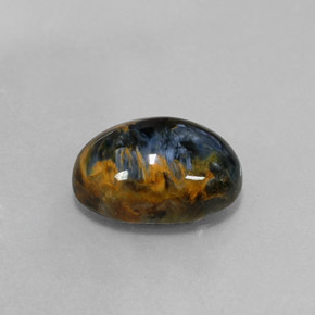 Pietersita multicolorido natural 6,03ct, corte oval, opaco