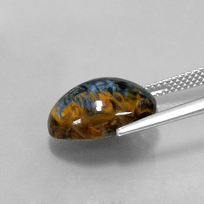 Pietersita multicolorido natural 6,03ct, corte oval, opaco