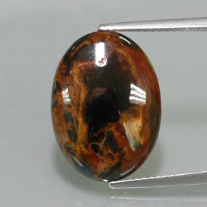Pietersita multicolorido natural 5,53ct, corte oval, opaco